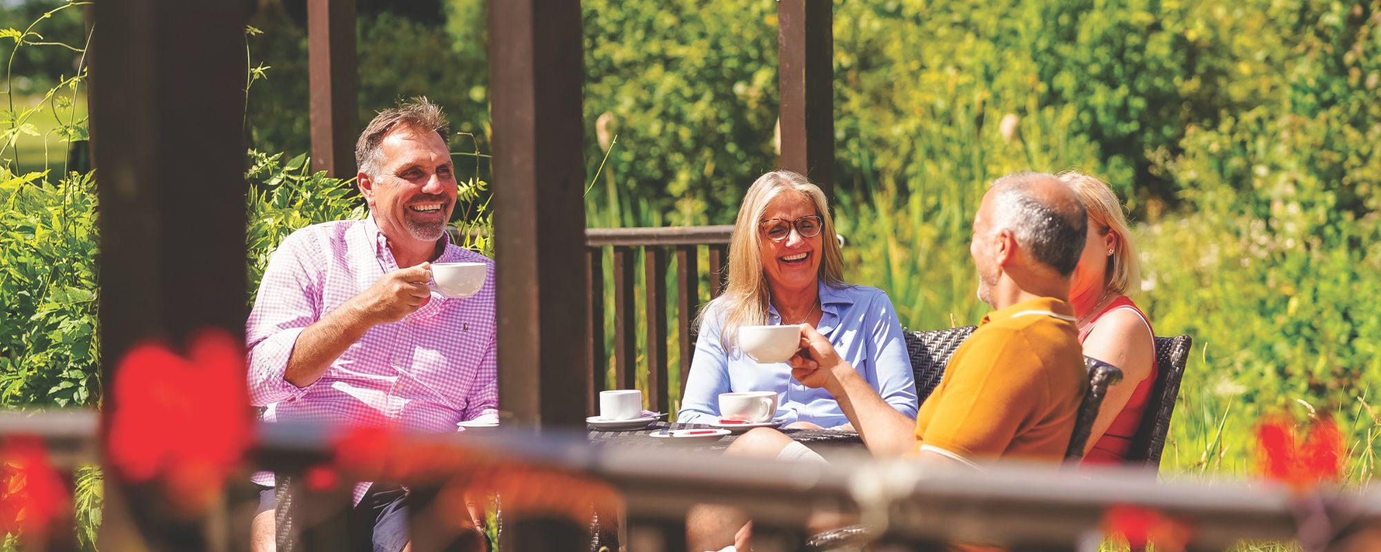 Guests at Potters Resorts Five Lakes enjoying a coffee break in the sunshine